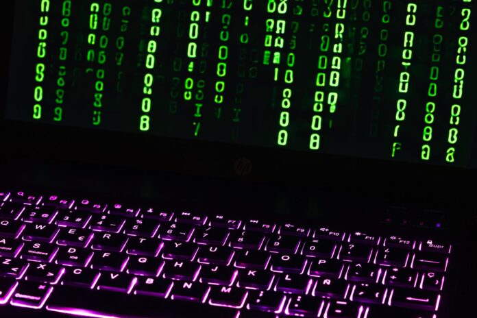 Matrix-inspired code on a laptop keyboard